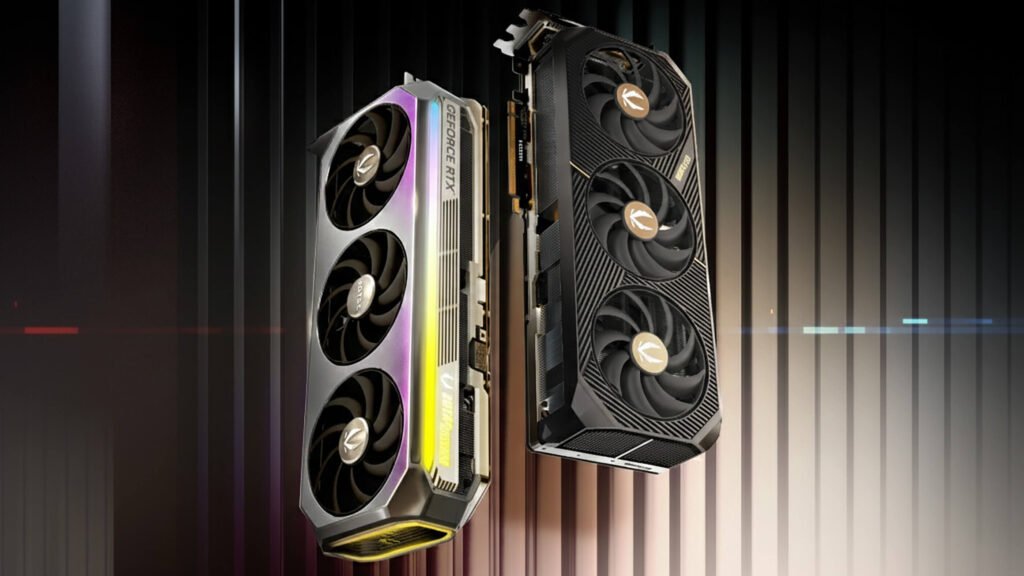 On the left, bold grey and white text displays the product name against a dark, vertically-ribbed background. On the right, two versions of the graphics card are shown at an angle: one featuring a sleek metallic silver shroud with a glowing yellow and green RGB light strip along the side, and another with a textured matte black finish. Both cards feature a triple-fan cooling system with the ZOTAC GAMING logo on the fan hubs.